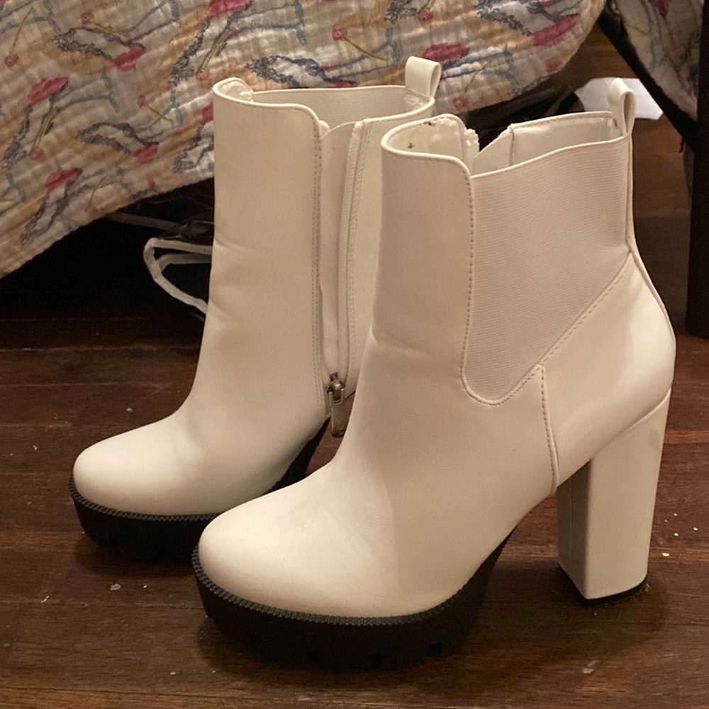 White X2B boots with thick black platform sole. Size 8